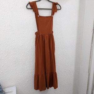 Orange pinafore dress